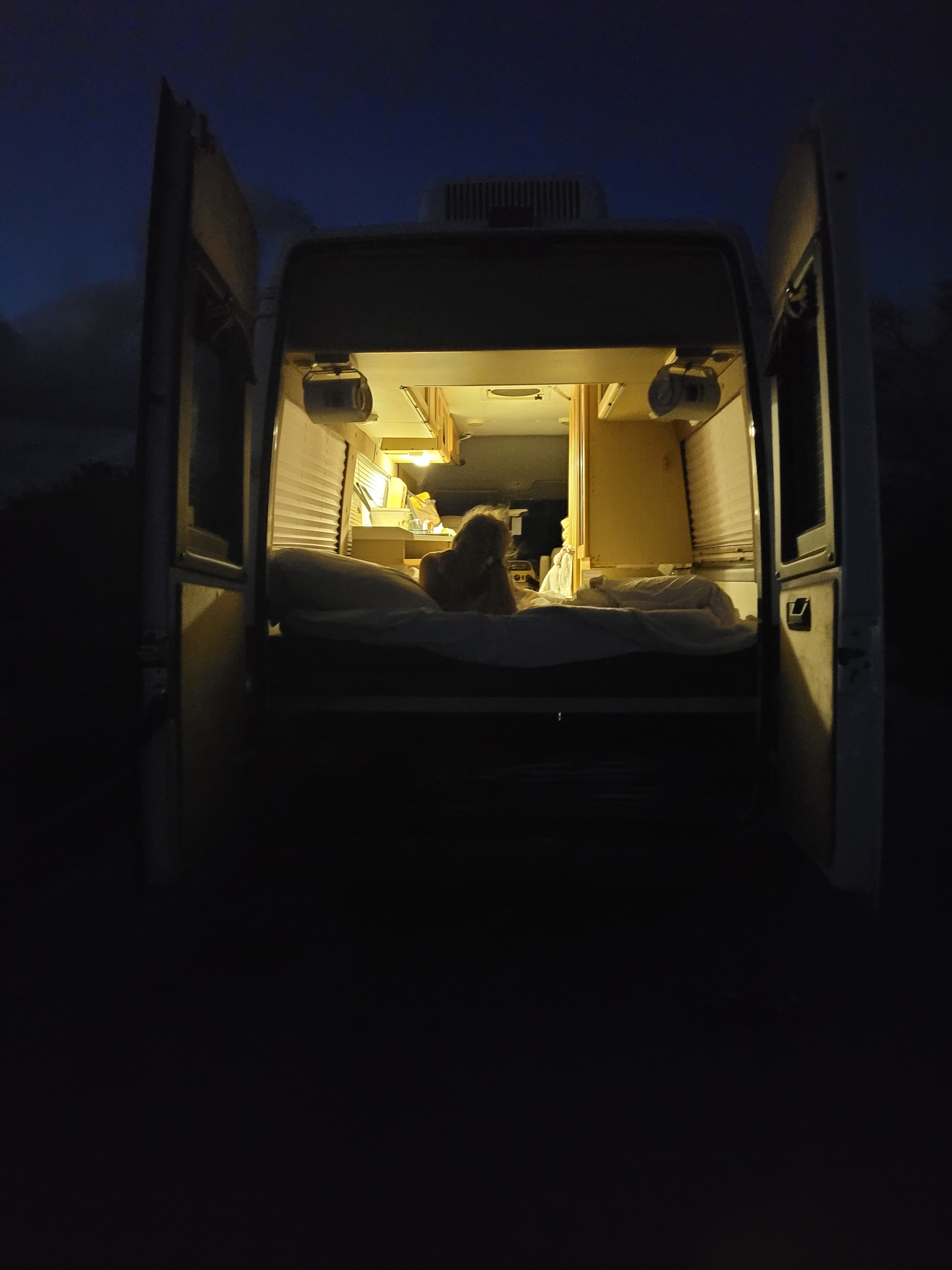 Cozy rv rental at night.. Roadtrek Roadtrek Class B 2006