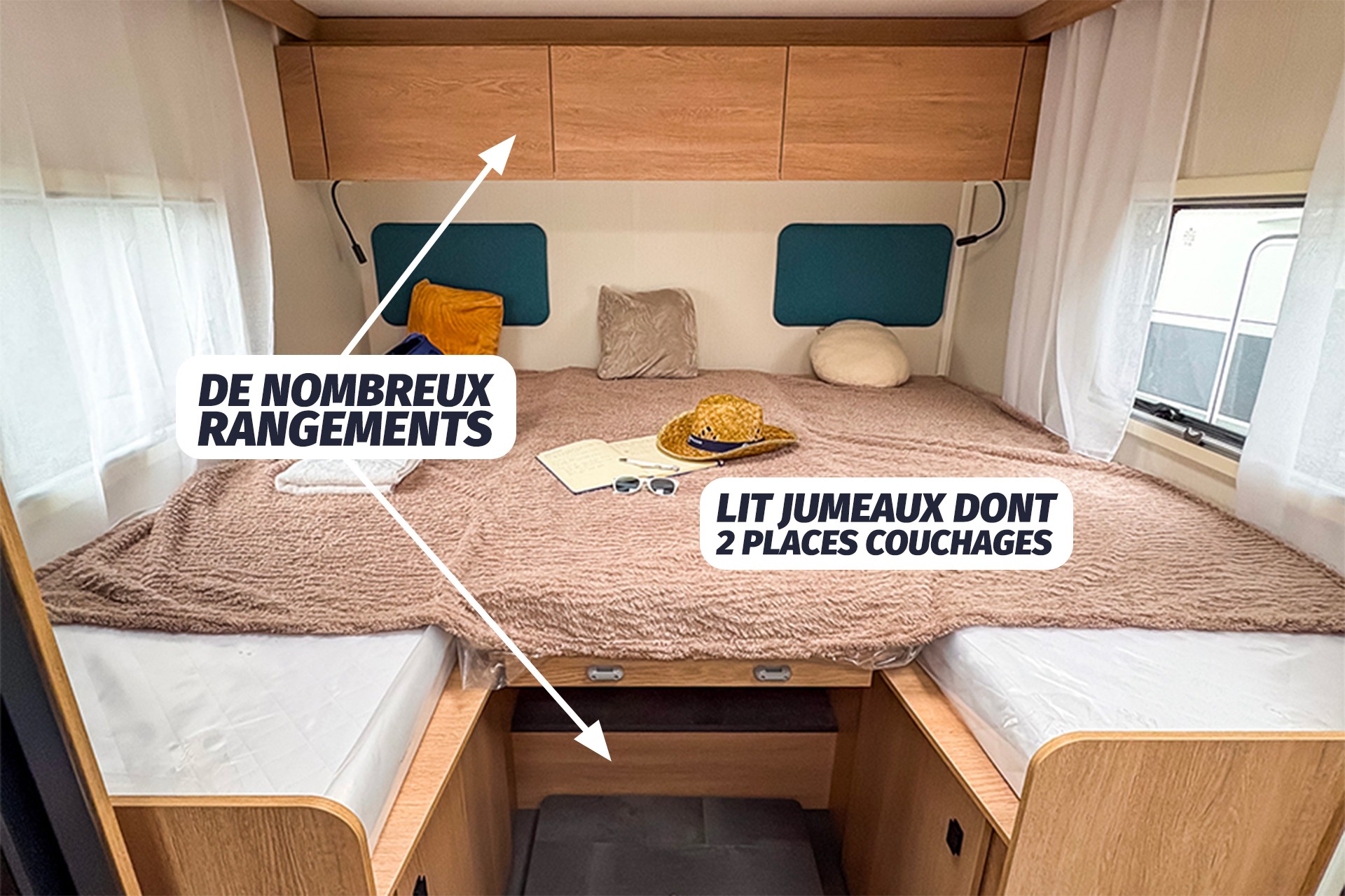 RV rental bedroom featuring a versatile bed (twin beds convert) & ample overhead/under-bed storage.. JOA CAMP JOA 75T 2024
