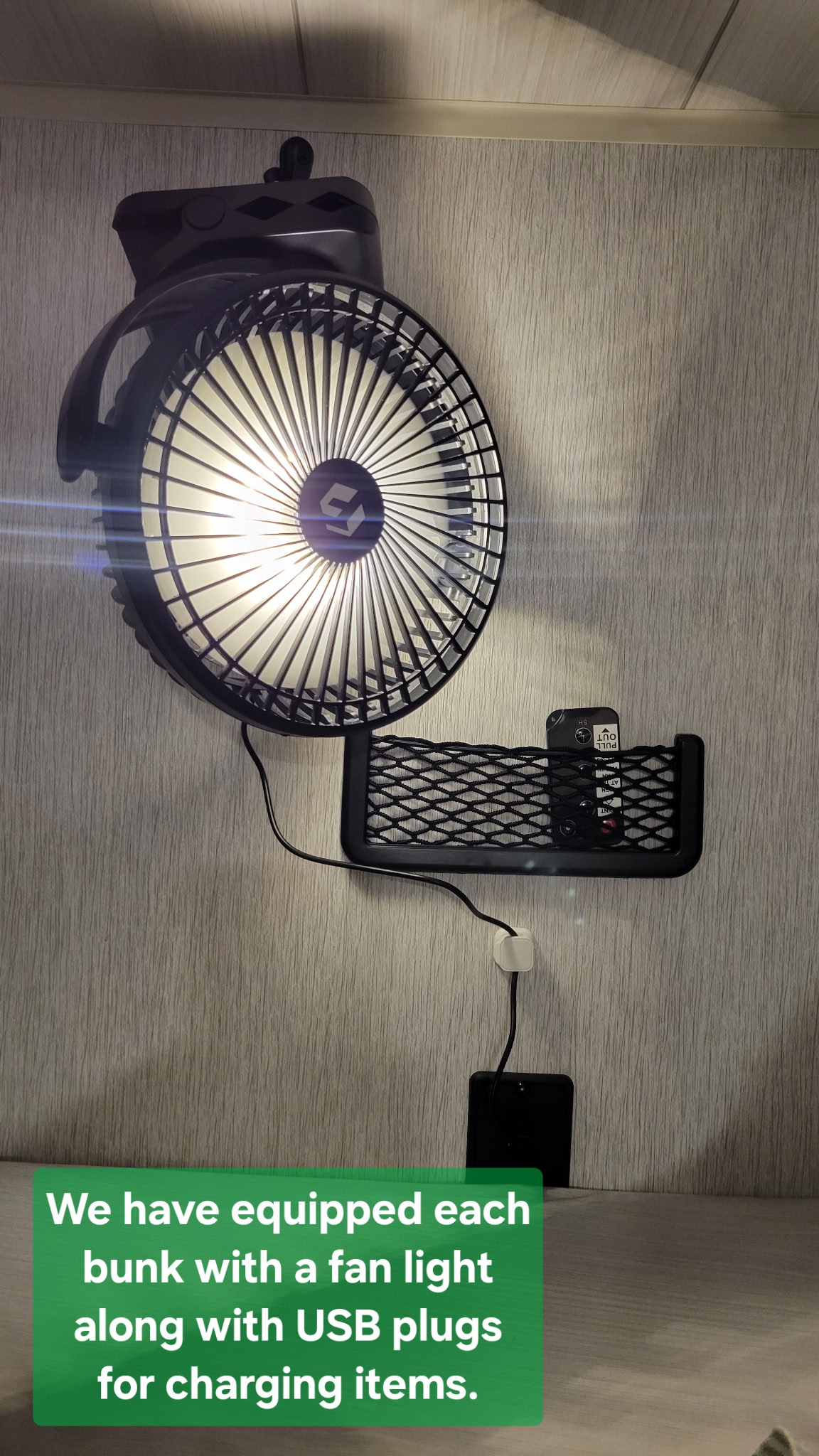 This RV rental bunk features a mounted fan with light, a mesh organizer, and USB charging for convenience.. Forest River Salem Cruise Lite 2023