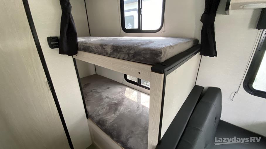 RV rental interior showing comfortable bunk beds, perfect for family sleeping in a camper.. Coachmen Apex Nano 2023