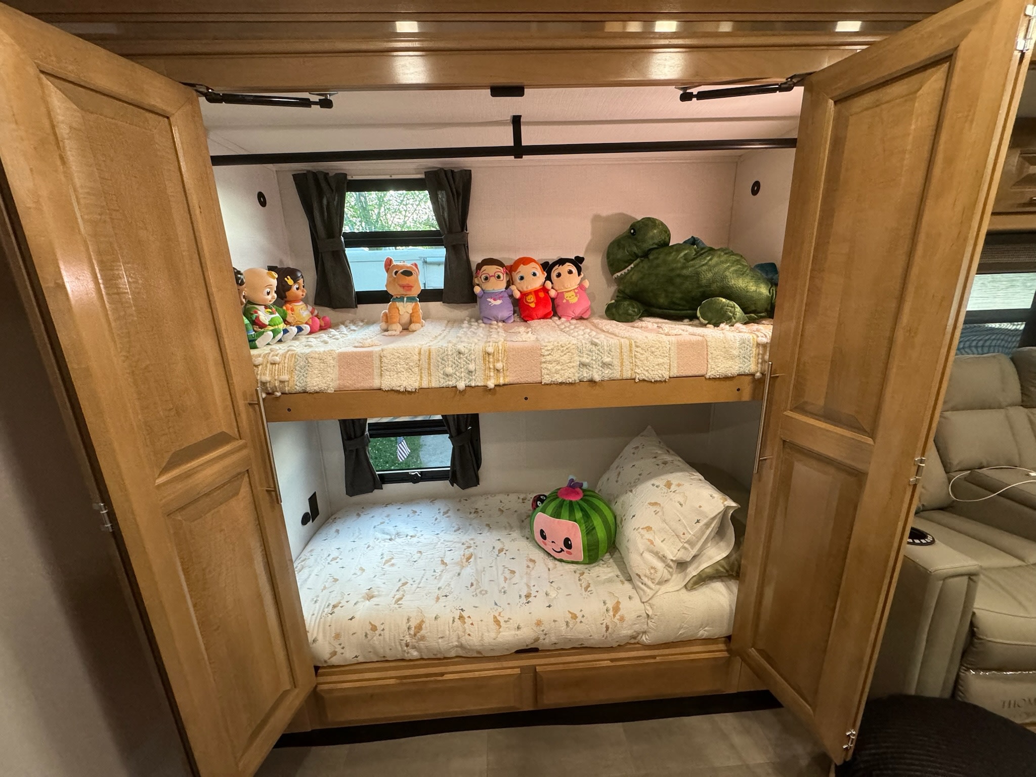RV rental: Bunk beds with stuffed animals & cozy bedding, perfect for family travel adventures.. Georgetown GT7 2024
