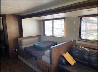 This RV rental offers a spacious living space with versatile convertible sofas and large windows for a comfortable journey.. Forest River Salem Cruise Lite 2018