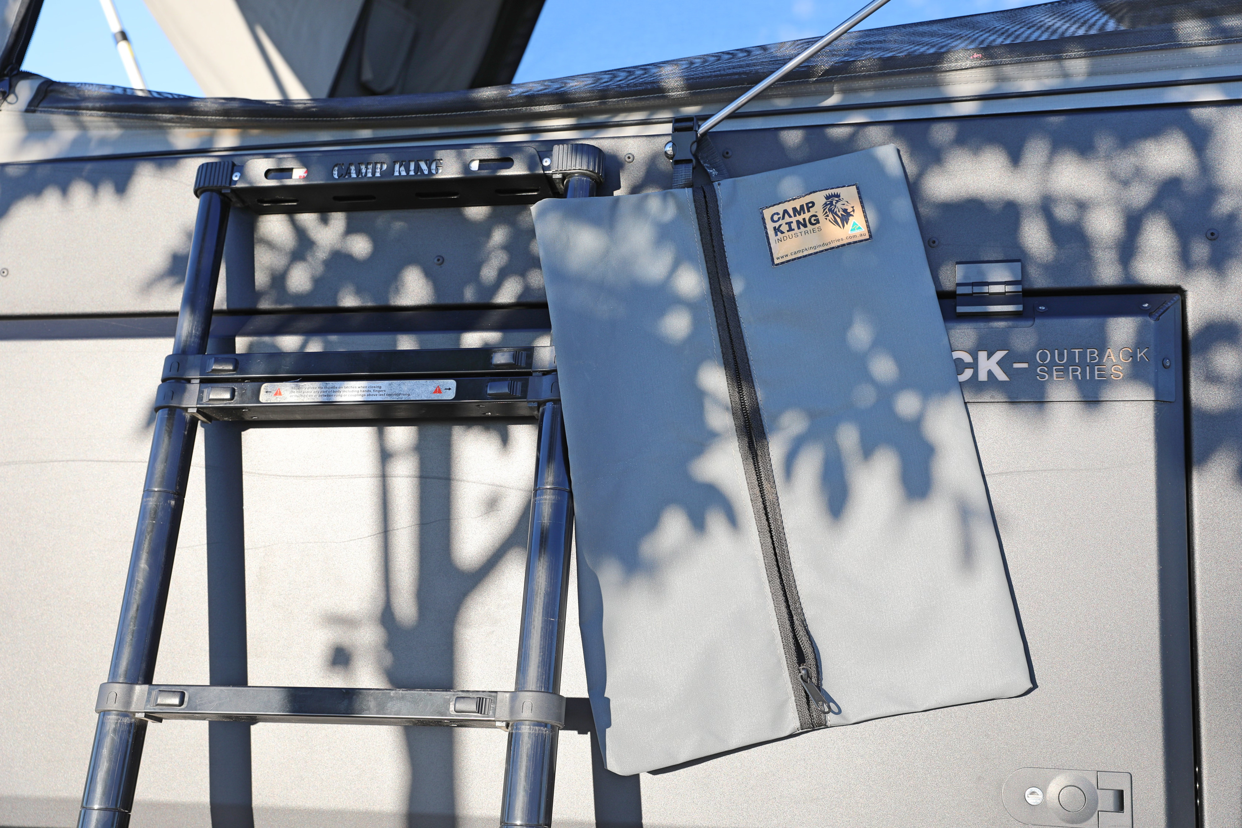 RV rental essentials: Telescoping ladder and Camp King Outback Series gear bag for outdoor adventures.. AEV Jeep Gladiator JT370 Classic 2022