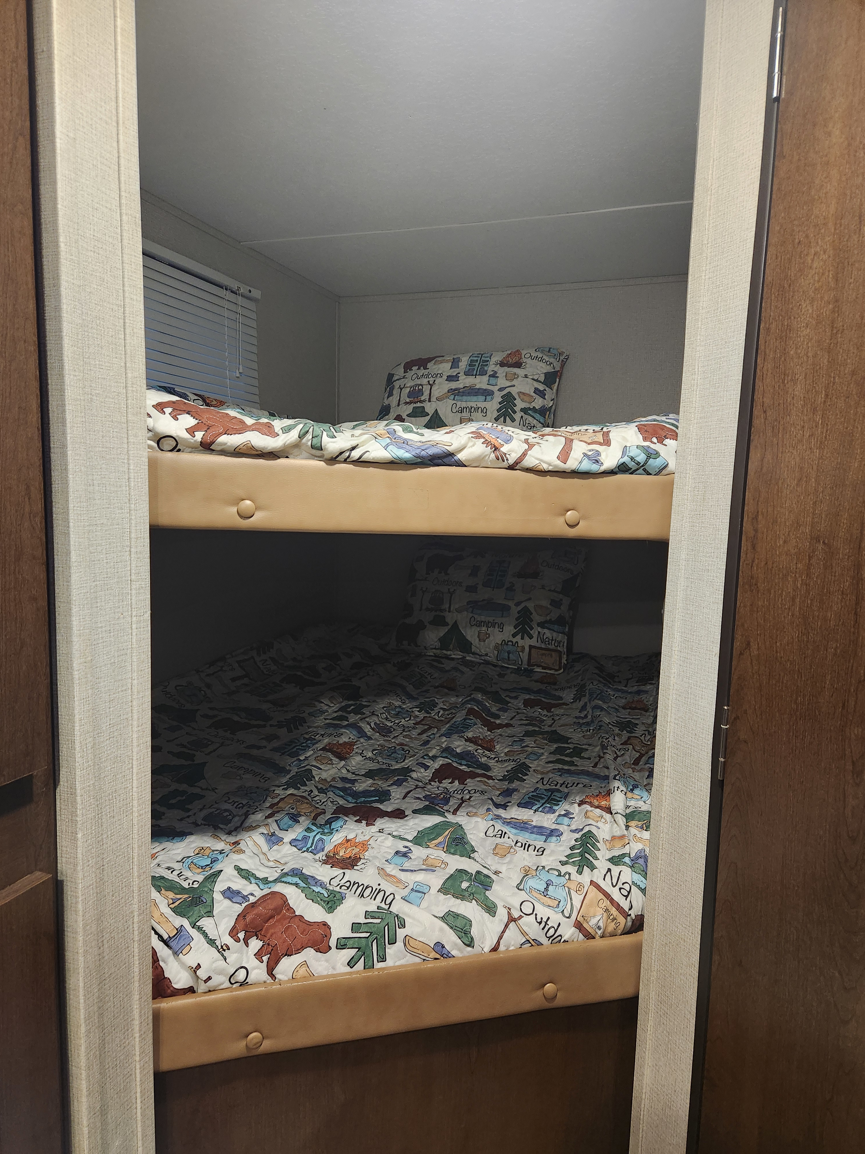 RV rental with cozy camping-themed bunk beds, perfect for family adventures.. Forest River Acadia 2018