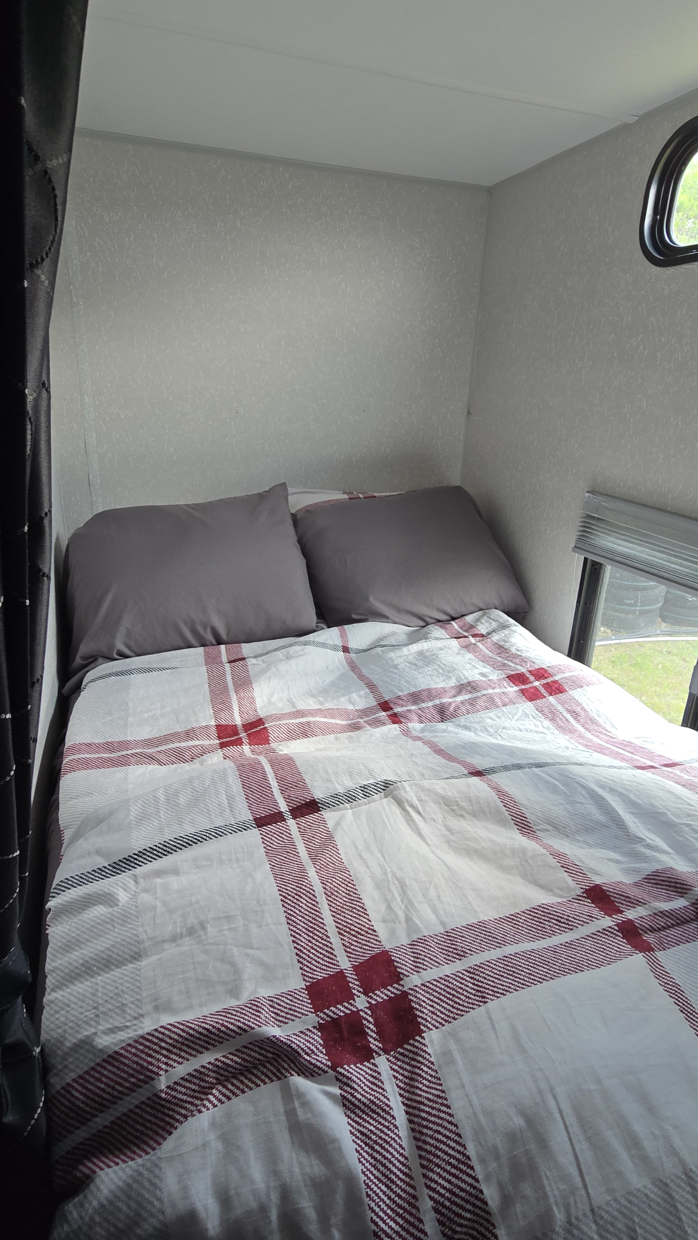 Double-size bed where the bunk used to be. Please note there is no "bunk" just the one bed. . Forest River Cherokee 2022