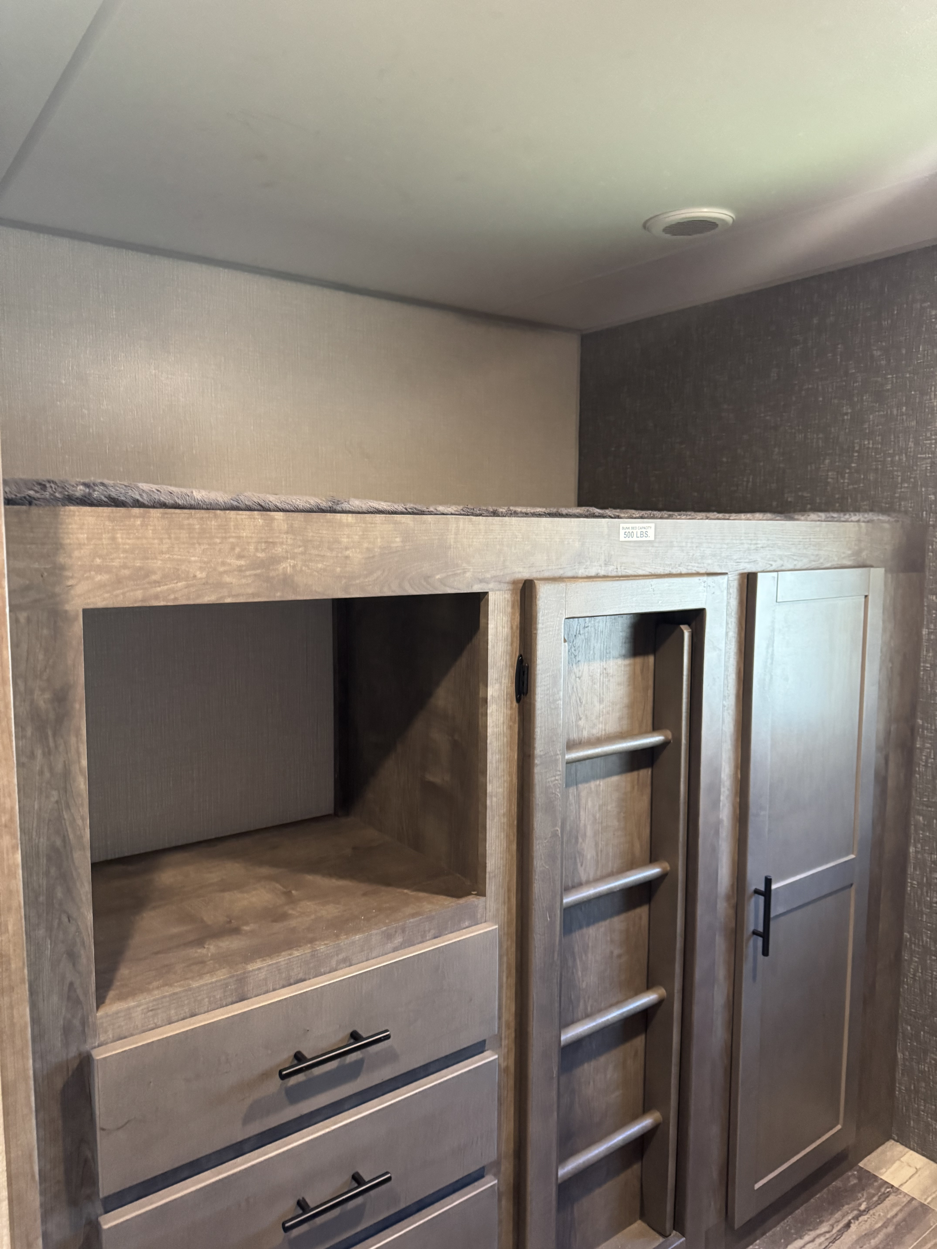 RV rental: Wooden bunk bed, built-in ladder, open cubby, and drawers provide smart interior storage.. KZ Connect 2021