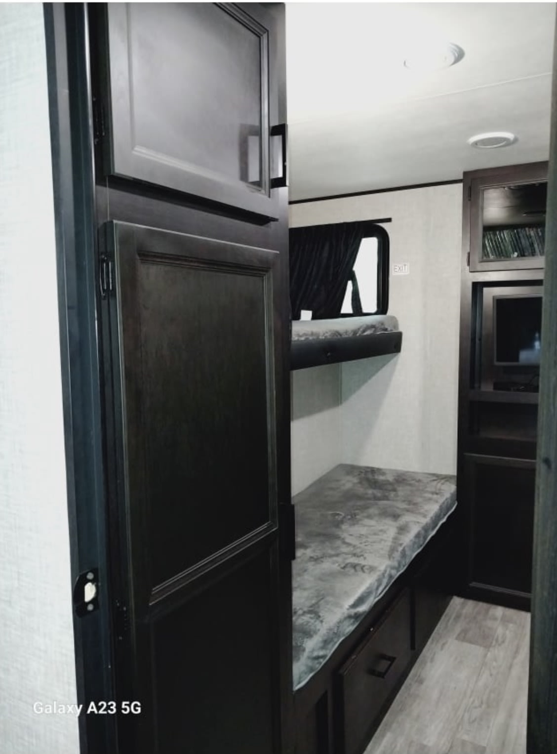 RV rental: Bunk beds offer a sleeping area with storage, window, and cabinets, perfect for family RV trips.. Jayco Jay Flight 2023