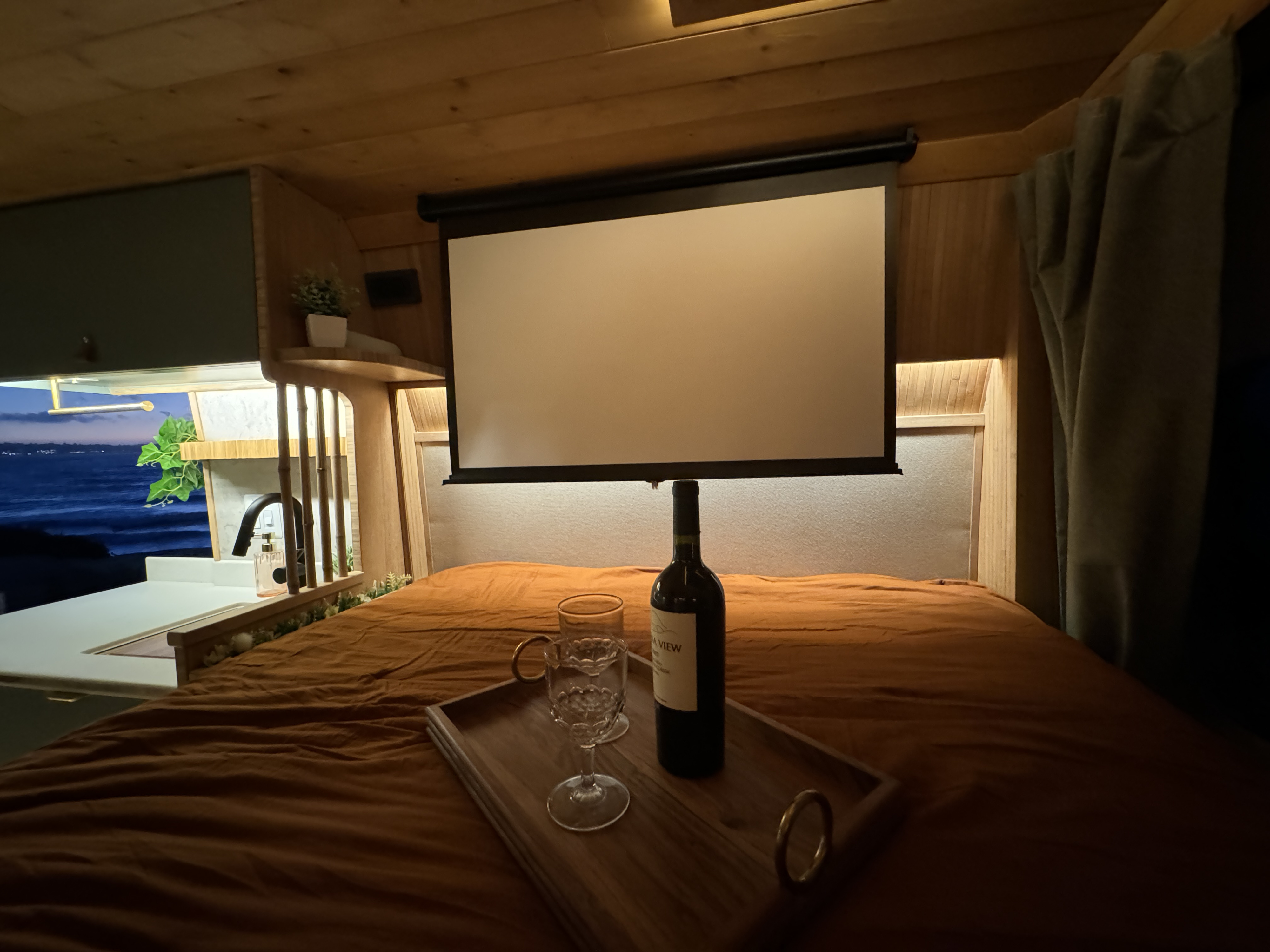 Experience luxury travel! This rv rental offers a projector screen, wine, and ocean views from a cozy bed.. Dodge Ram Promaster 2500 2020