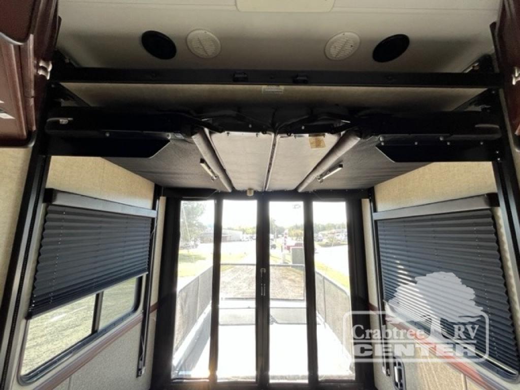 RV rental: View of toy hauler garage with drop-down bunk bed, side windows with blinds, and rear access.. Heartland Road Warrior 425 2016