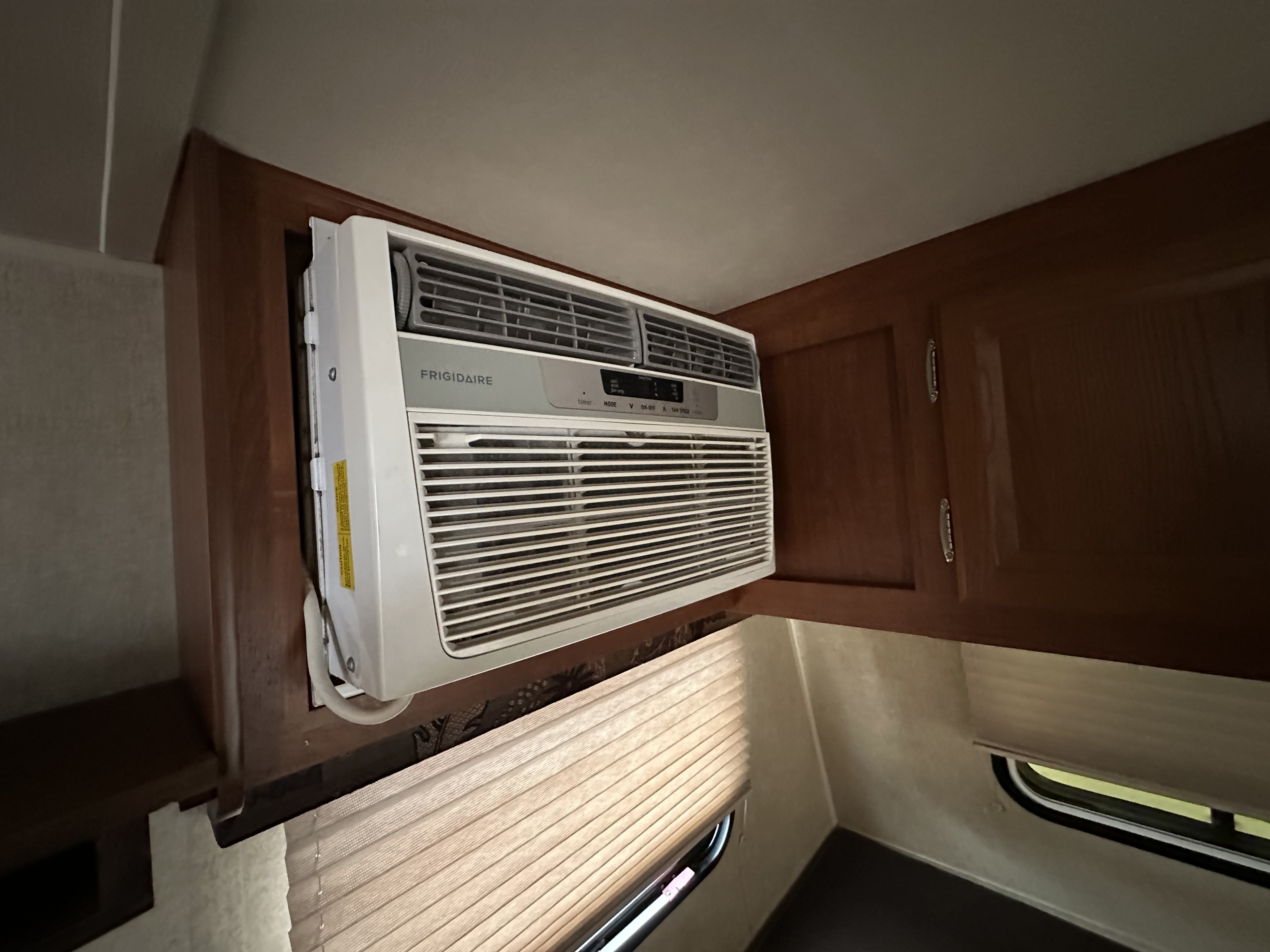 RV rental interior featuring a high-mounted Frigidaire AC unit for comfort on the road.. Jayco Jay Flight Swift SLX 2014