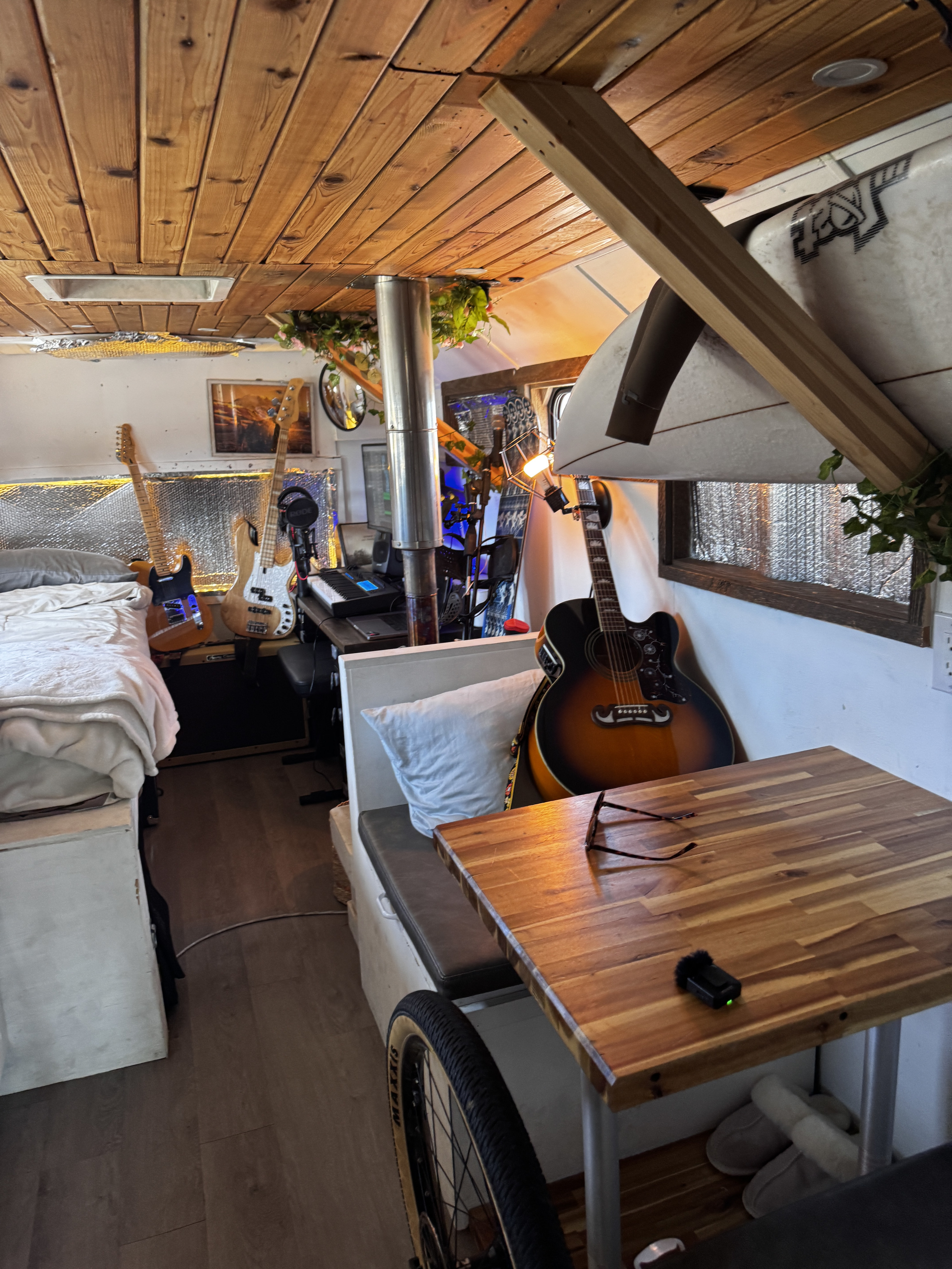 This cozy RV rental features a music studio, multiple guitars, and comfortable living space, perfect for creative travel.. Ford E450 2005