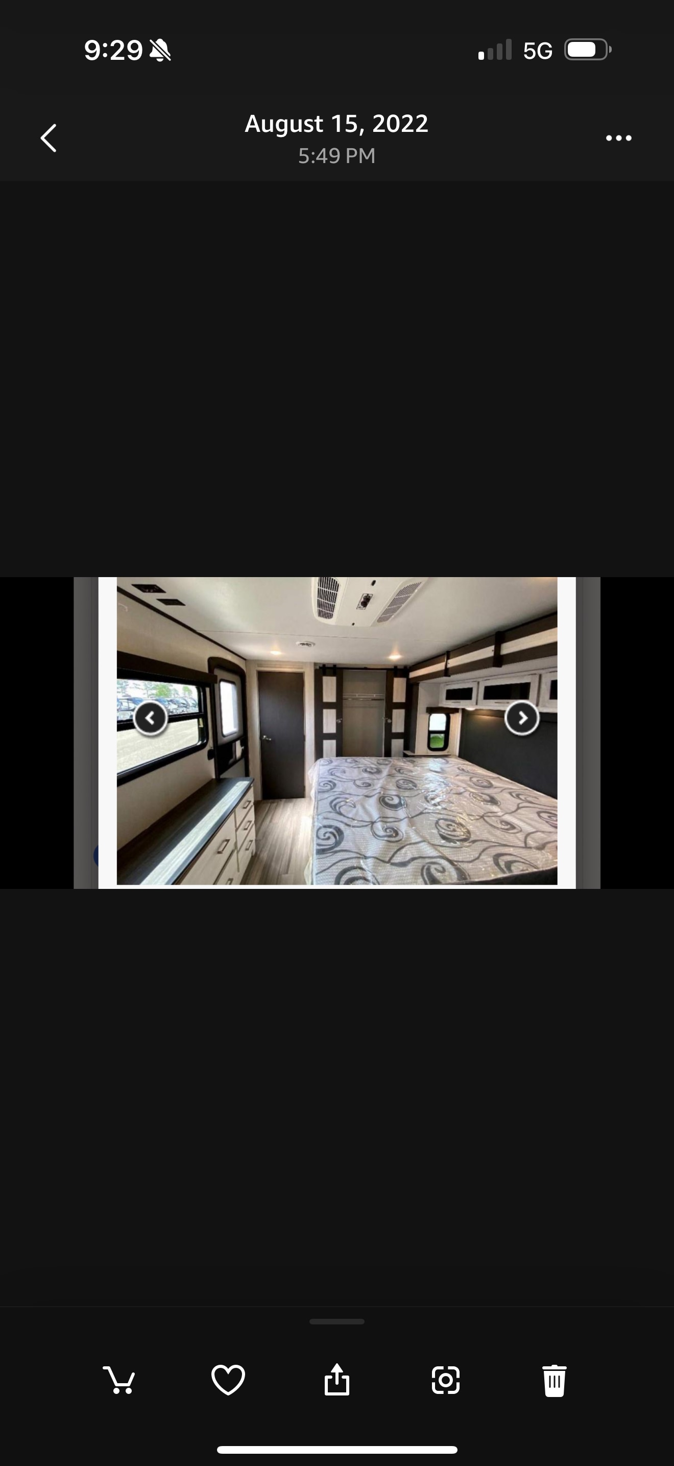 Inside a modern RV rental bedroom with a bed, cabinets, and window. Perfect for your next adventure.. Keystone RV Sprinter Limited 2021