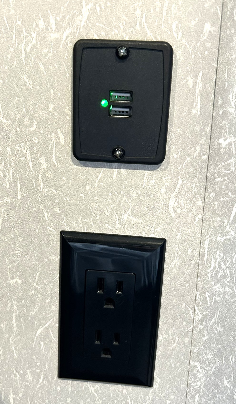 RV rental essential: USB charging ports (green light on) & electrical outlets for your devices.. Forest River Cherokee 2021