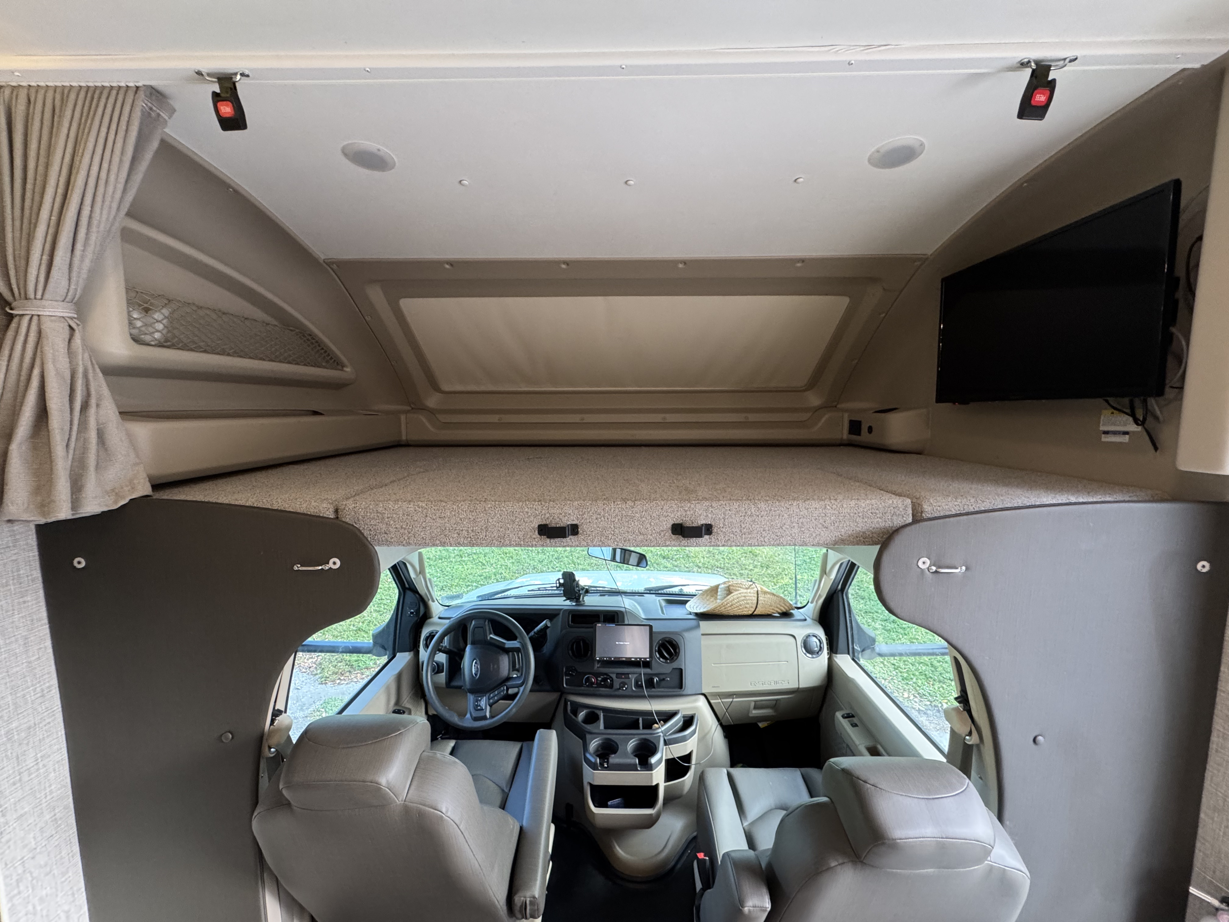 This rv rental offers a spacious interior: driver's cockpit, overhead bed, and wall-mounted TV, ready for adventure.. Entegra Coach Odyssey 2023