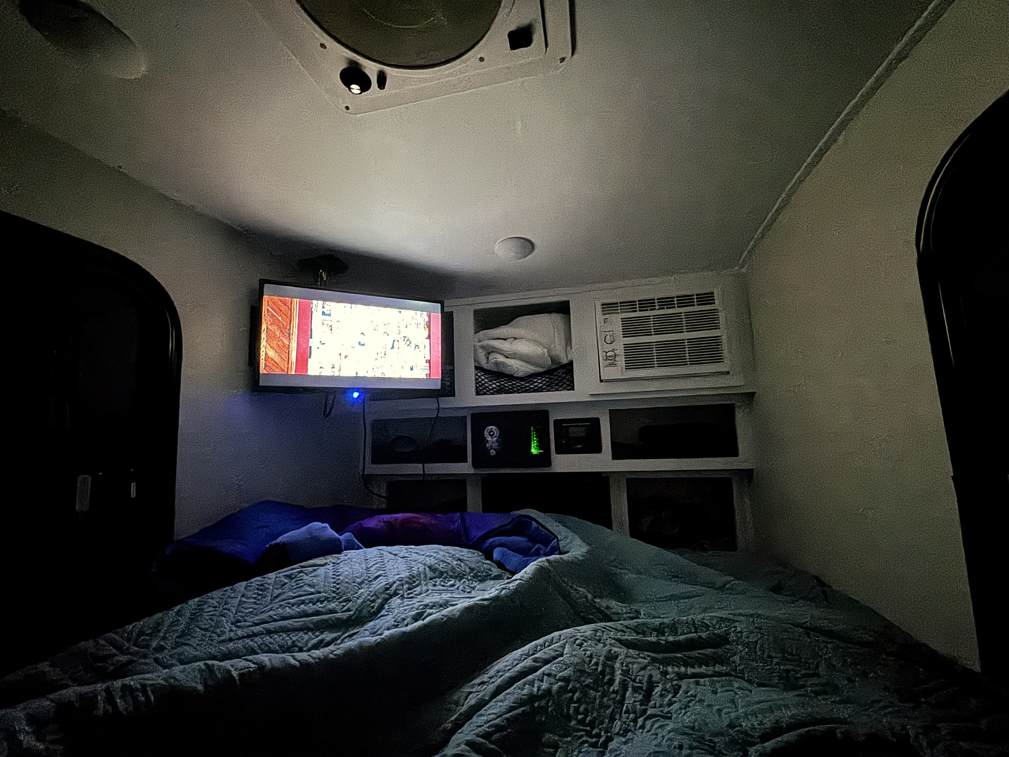 Cozy RV rental interior with a comfy bed, TV for entertainment, and compact storage, perfect for a night in.. Modern Buggy 12 LRK 2026