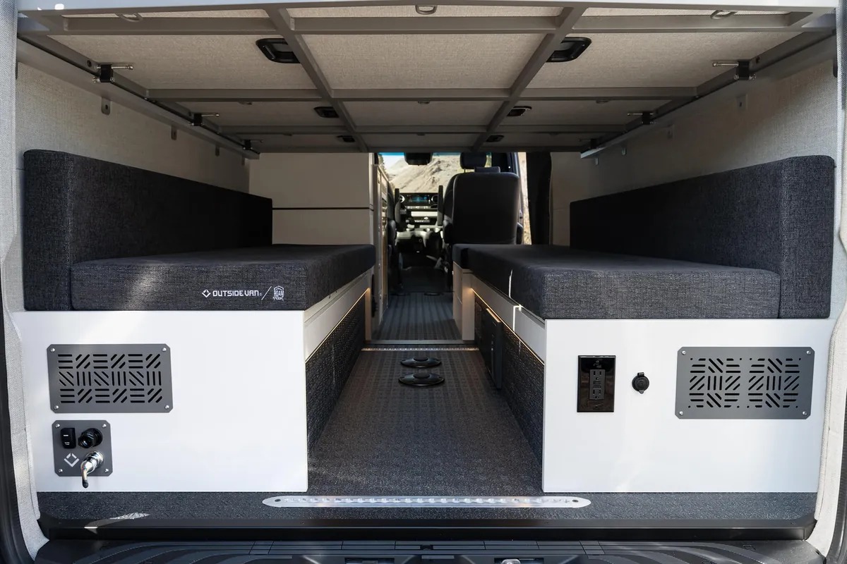 Modern rv rental van interior with comfy twin bench beds & essential utilities. Ready for your road trip comfort.. Outside Van Approach 170 2024