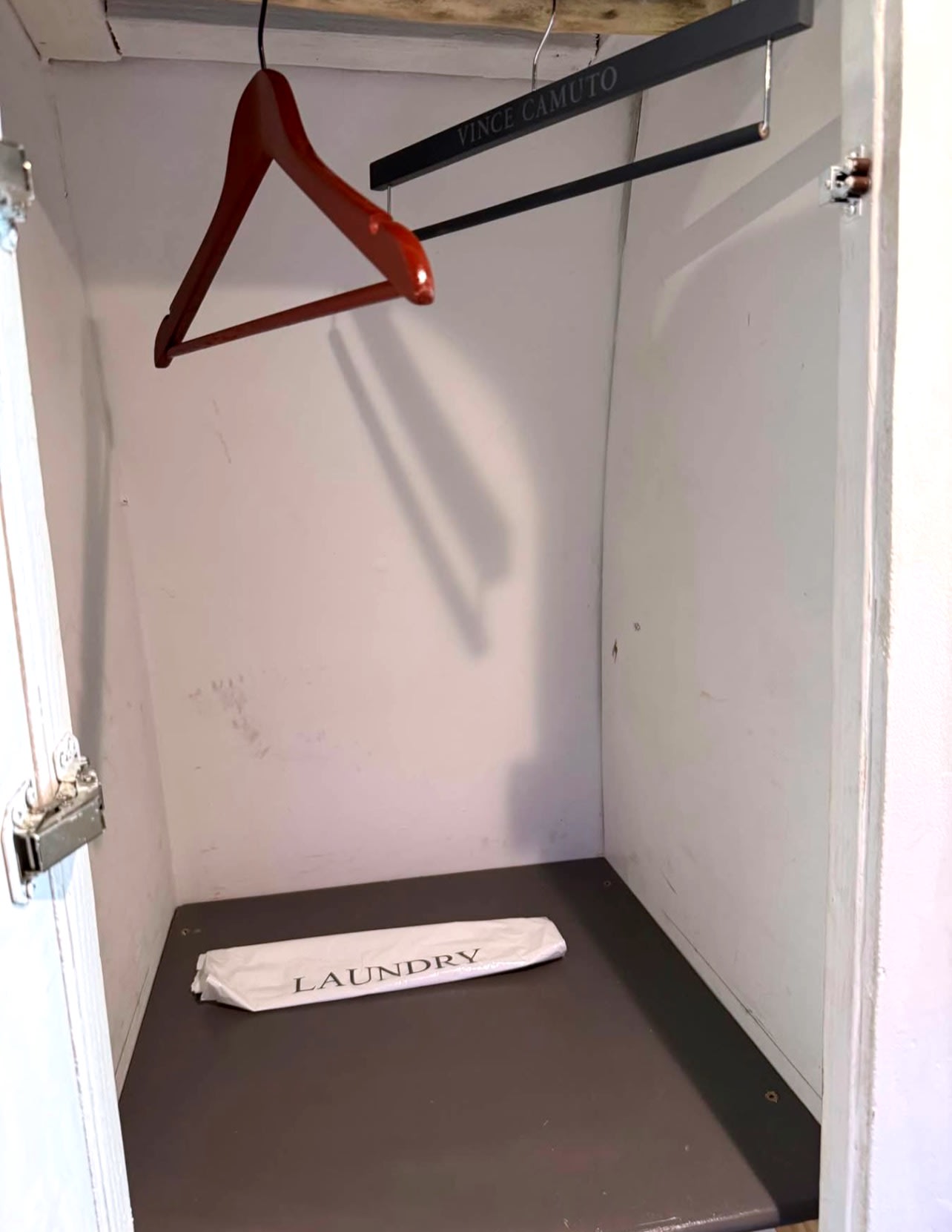 Compact RV rental closet: hangers, including a Vince Camuto one, and a laundry bag for your travel essentials.. Ram Promaster 2500 2019