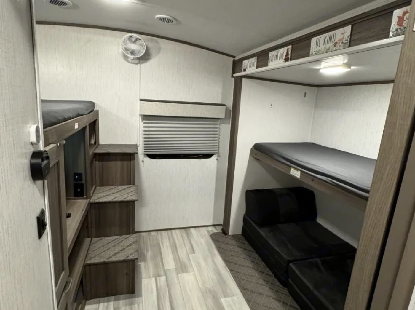 This rv rental offers comfy bunk beds, a pull-out sofa, and integrated steps, perfect for family adventures.. Cruiser RV MPG 2023