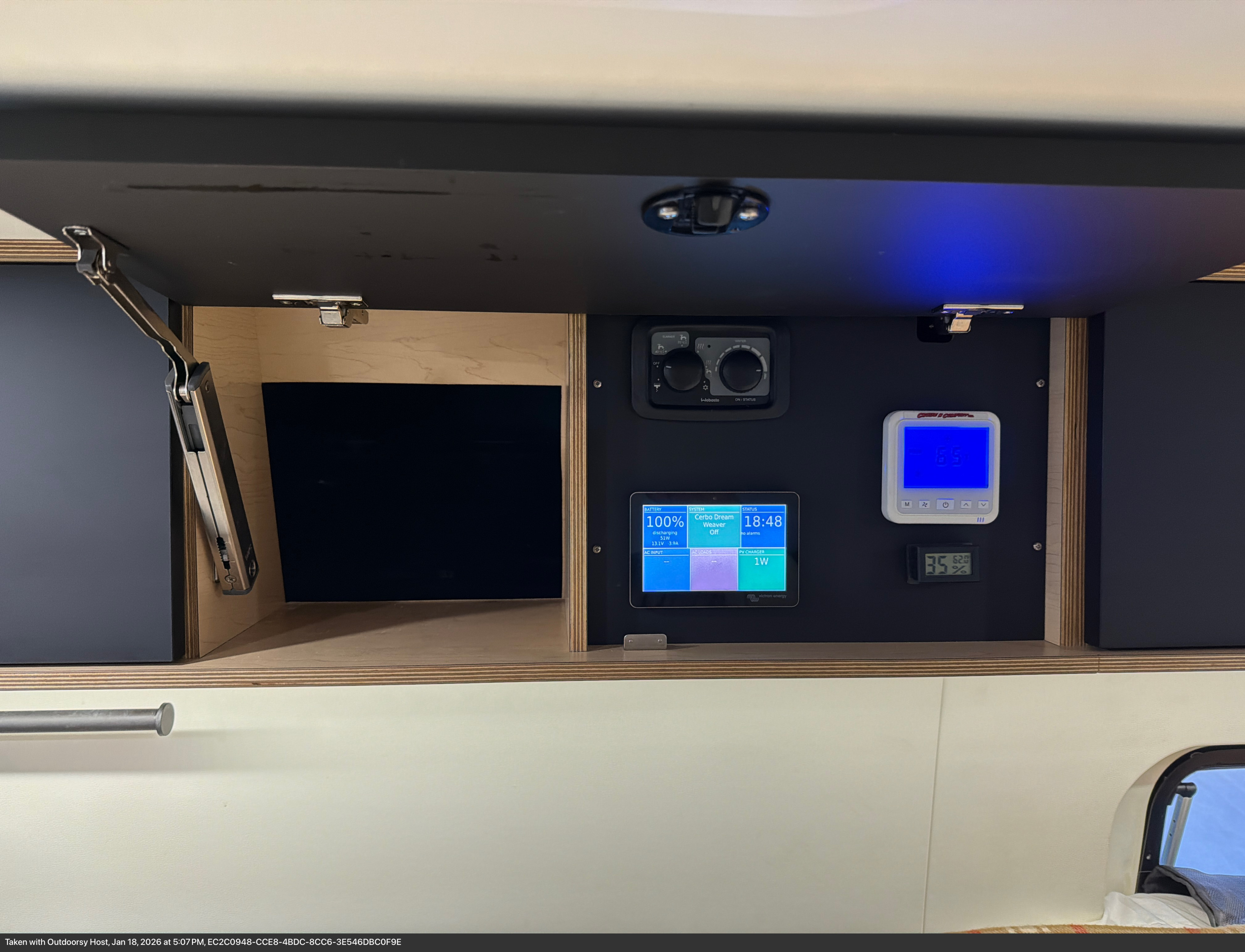 An RV rental's essential control panel showing battery status, Webasto heater settings, and AC thermostat for comfort.. MERCEDEZ SPRINTER 17) 4X4 2021