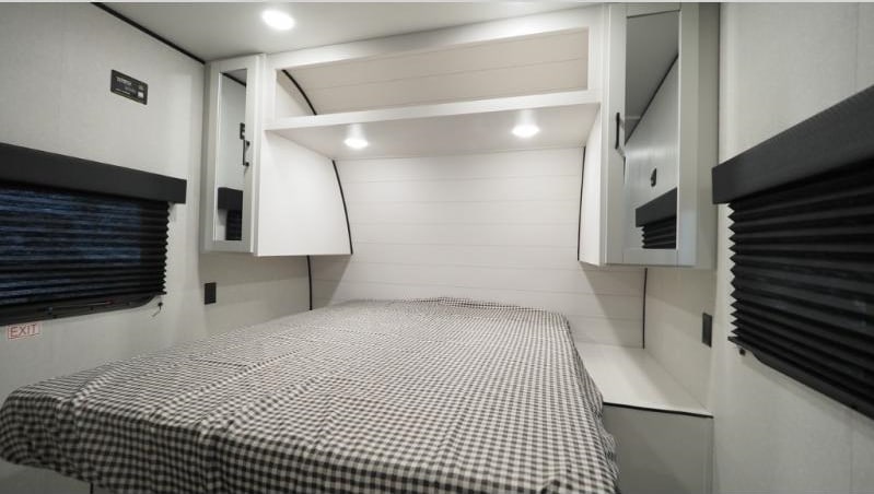 RV rental: Bright, modern bedroom with a comfortable bed, convenient overhead storage, and blackout blinds.. Jayco Jay Flight SLX 260BH 2026