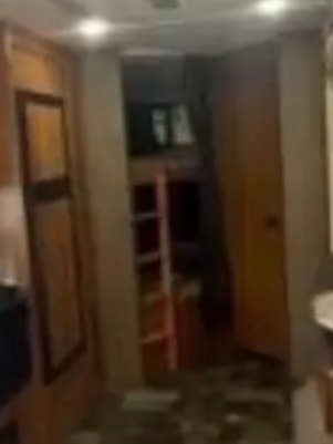 RV rental interior: Hallway view of cozy bunk beds with a ladder, providing extra sleeping space in a travel trailer.. Starcraft AR-One Maxx 2017