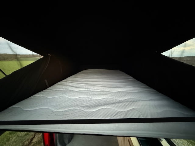 RV rental: Comfy pop-top bed in camper tent. Enjoy scenic views & adventure from this sleeping space.. VOLKSWAGEN TRANSPORTER T6 2016