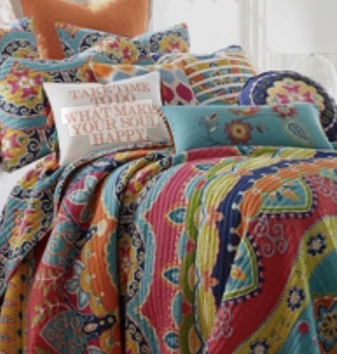 Vibrant, boho quilt & pillows, with a "happy soul" message. Perfect for personalizing your RV rental space for comfort.. Riverside RV Retro 2020