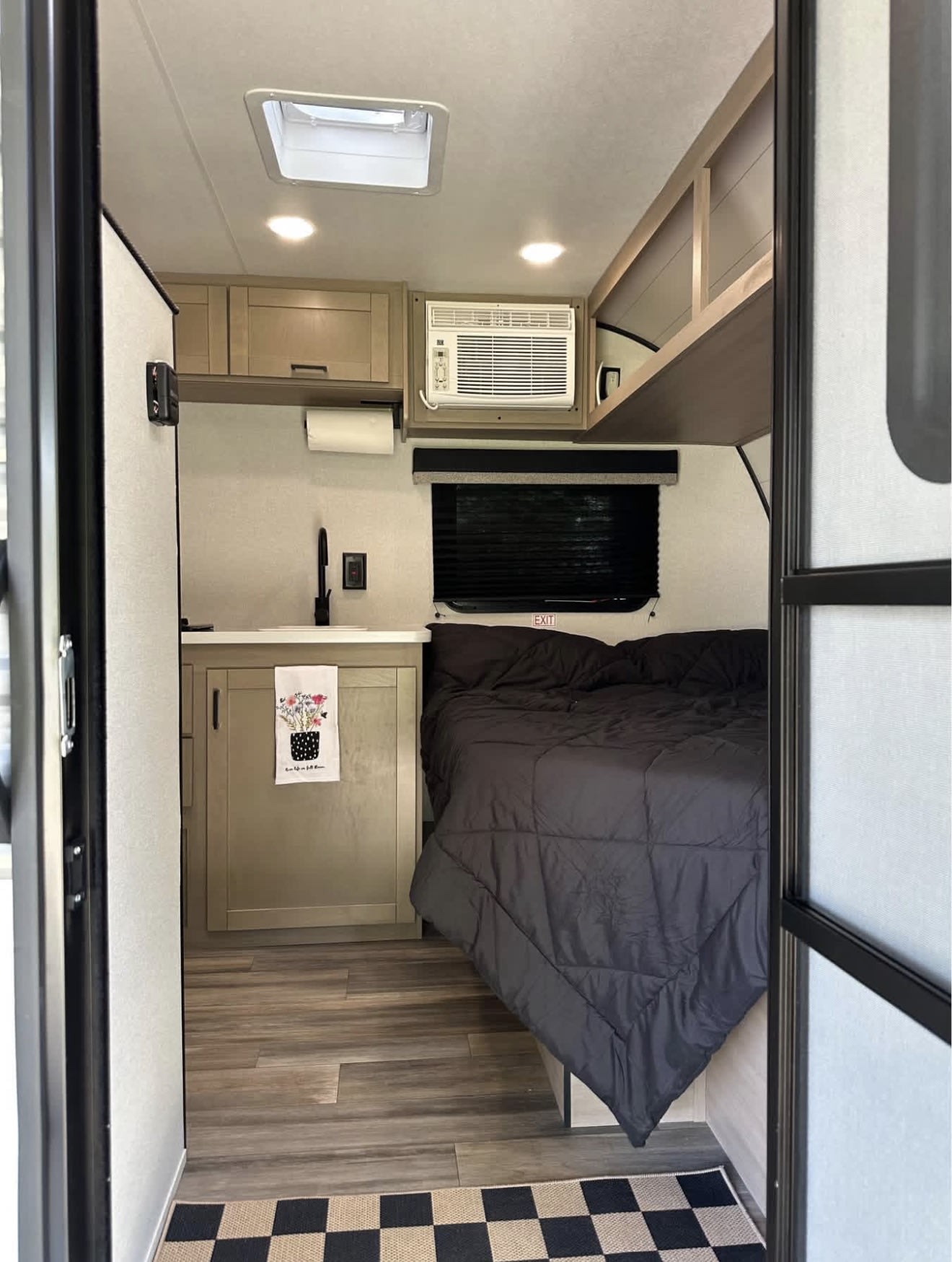 This RV rental features a compact kitchenette, comfy bed, AC, and overhead storage. Ideal for a comfortable road trip.. Highland Ridge RV Colt 2026