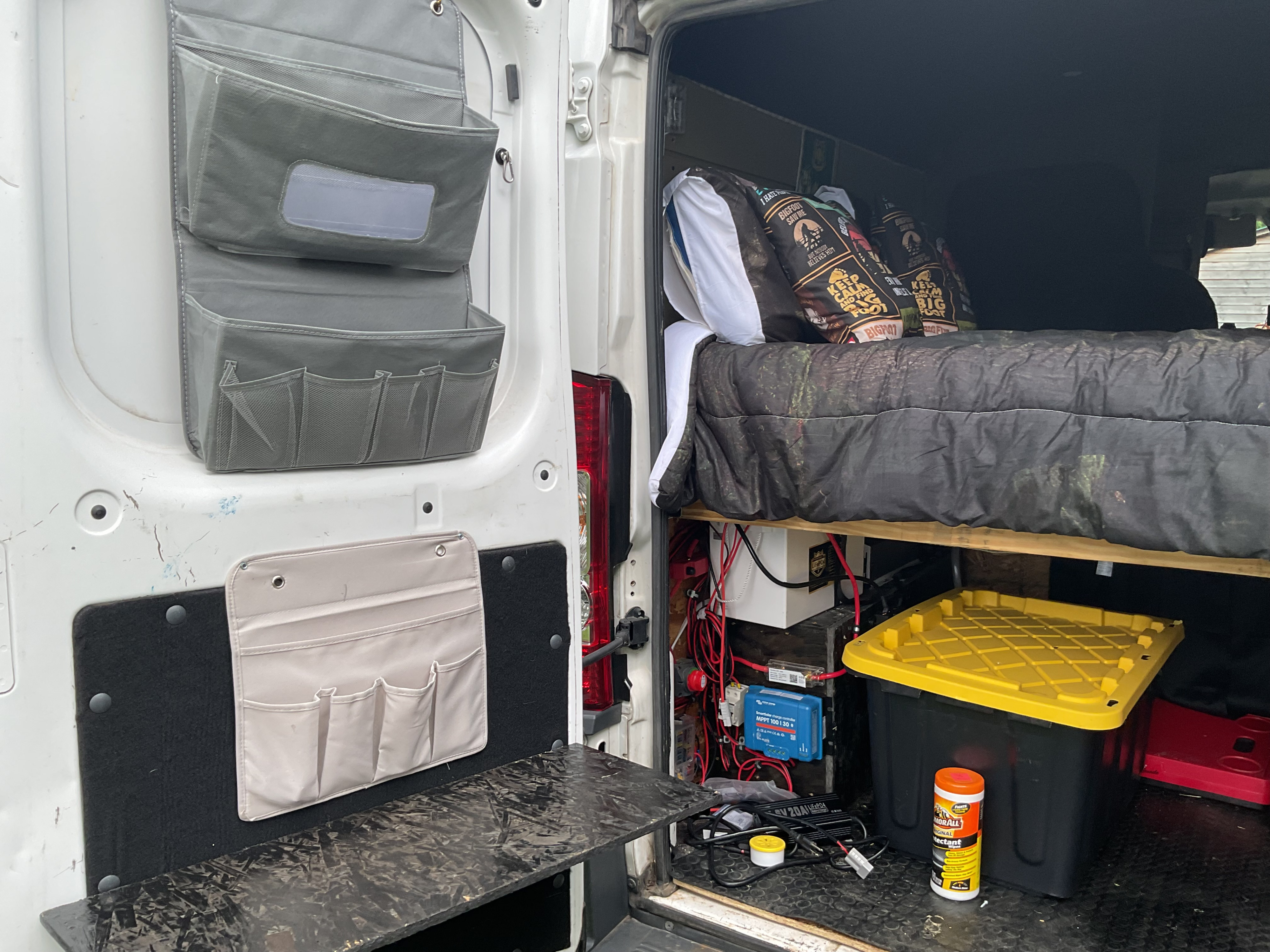 This RV rental features clever storage solutions: door organizers, a bed with "Bigfoot" pillows, and under-bed power/storage.. Ram Promaster 2015