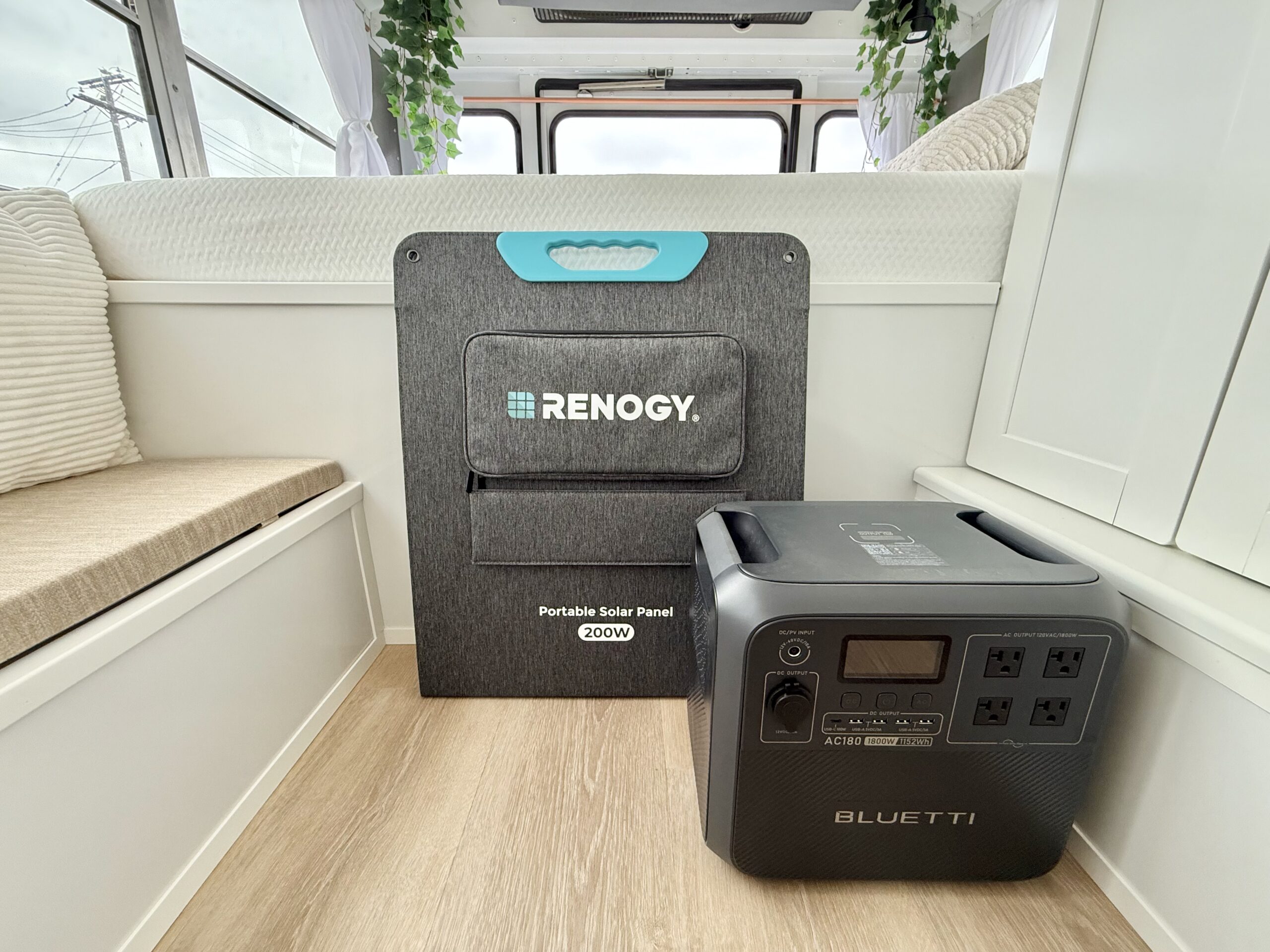 Essential for your rv rental: Renogy 200W portable solar panel and Bluetti AC180 power station, providing off-grid energy.. Chevy Express 2007