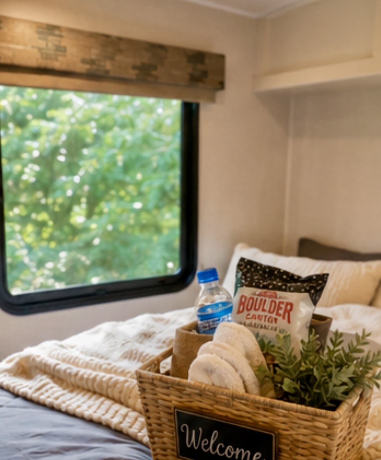 Welcome to your cozy RV rental! Enjoy amenities, snacks, and nature views from your comfortable bed.. Winnebago 2500RL 2018