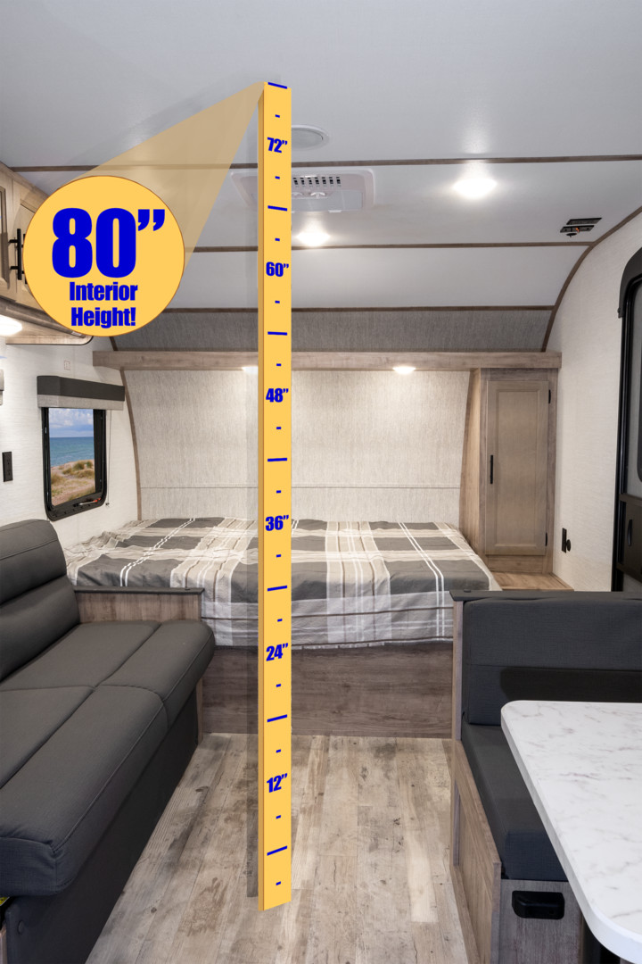 Explore this spacious RV rental featuring an impressive 80" interior height, measured floor-to-ceiling with a visible ruler.. Gulf Stream Ameri-Lite 2026