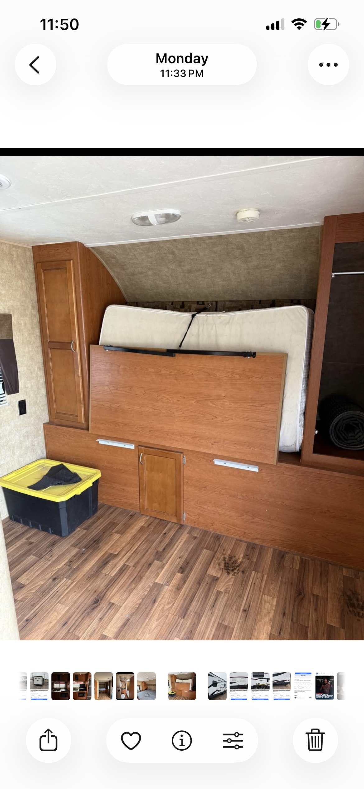RV rental showing a clever folding bed, cabinets, and storage box in a compact interior.. Forest River Cherokee Wolf Pack 2013