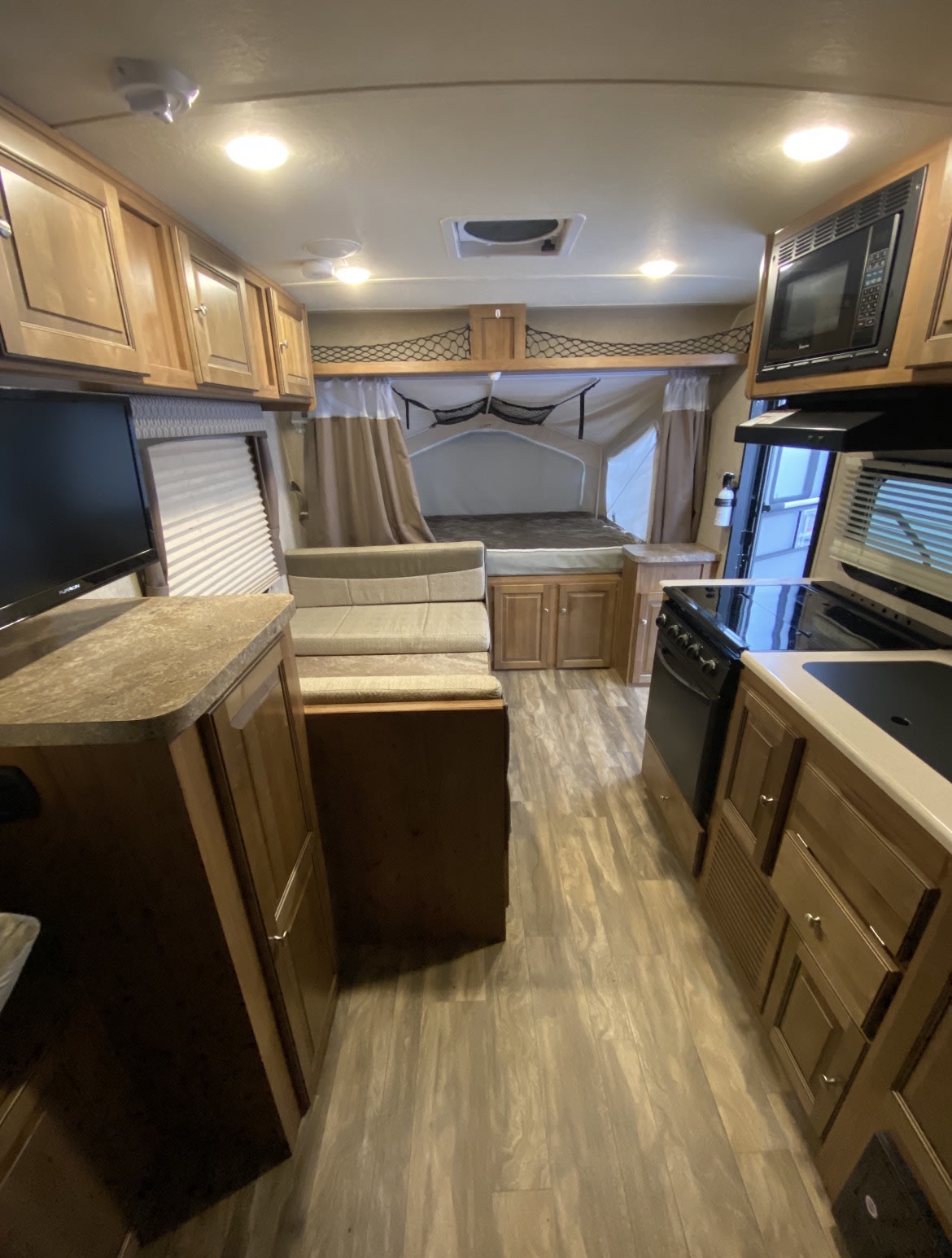 Hybrid with Three Queen Beds and All the Comforts