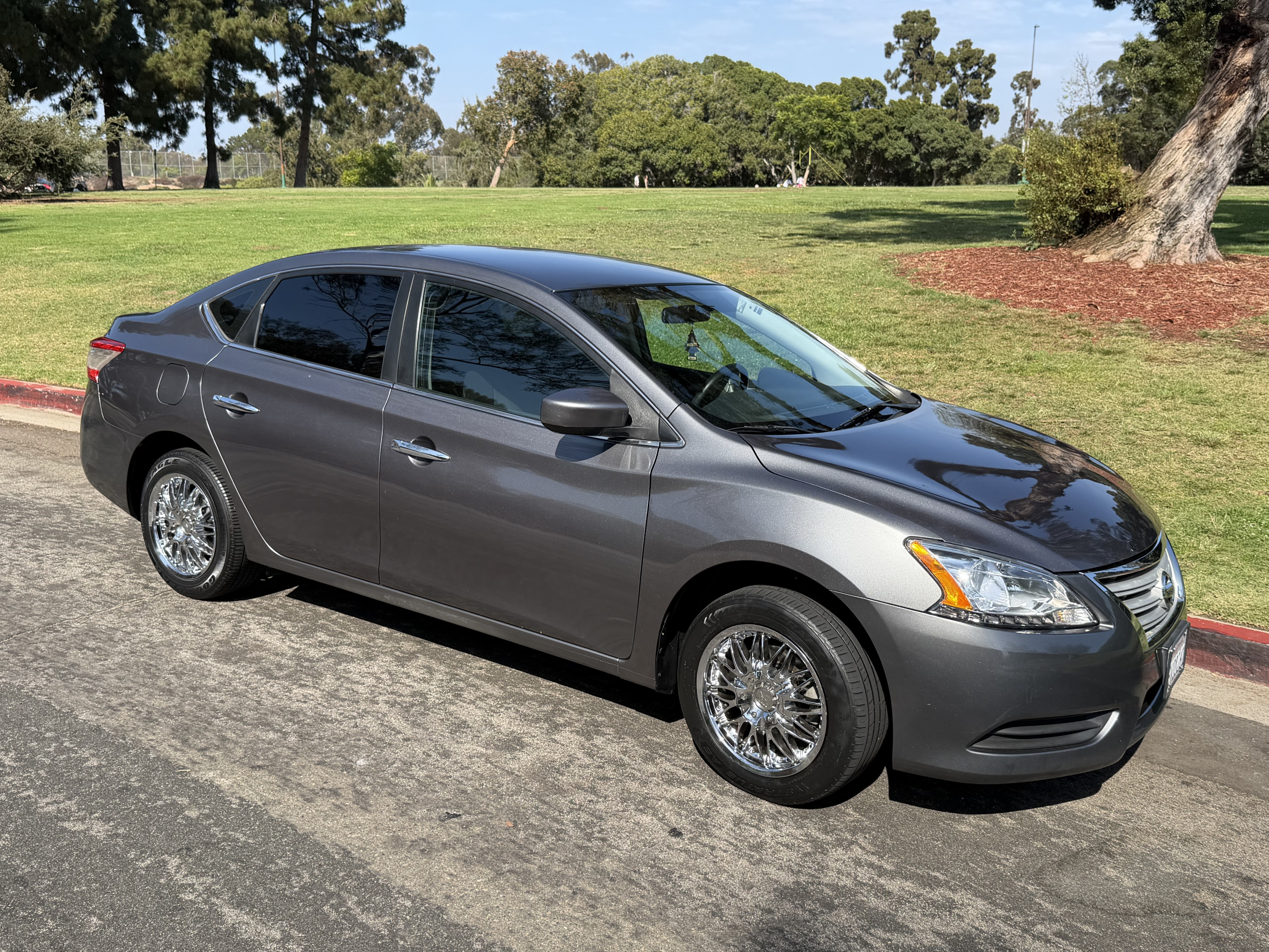 2015 Nissan Sentra S – Gray | Weekly & Long-Term Rental Description