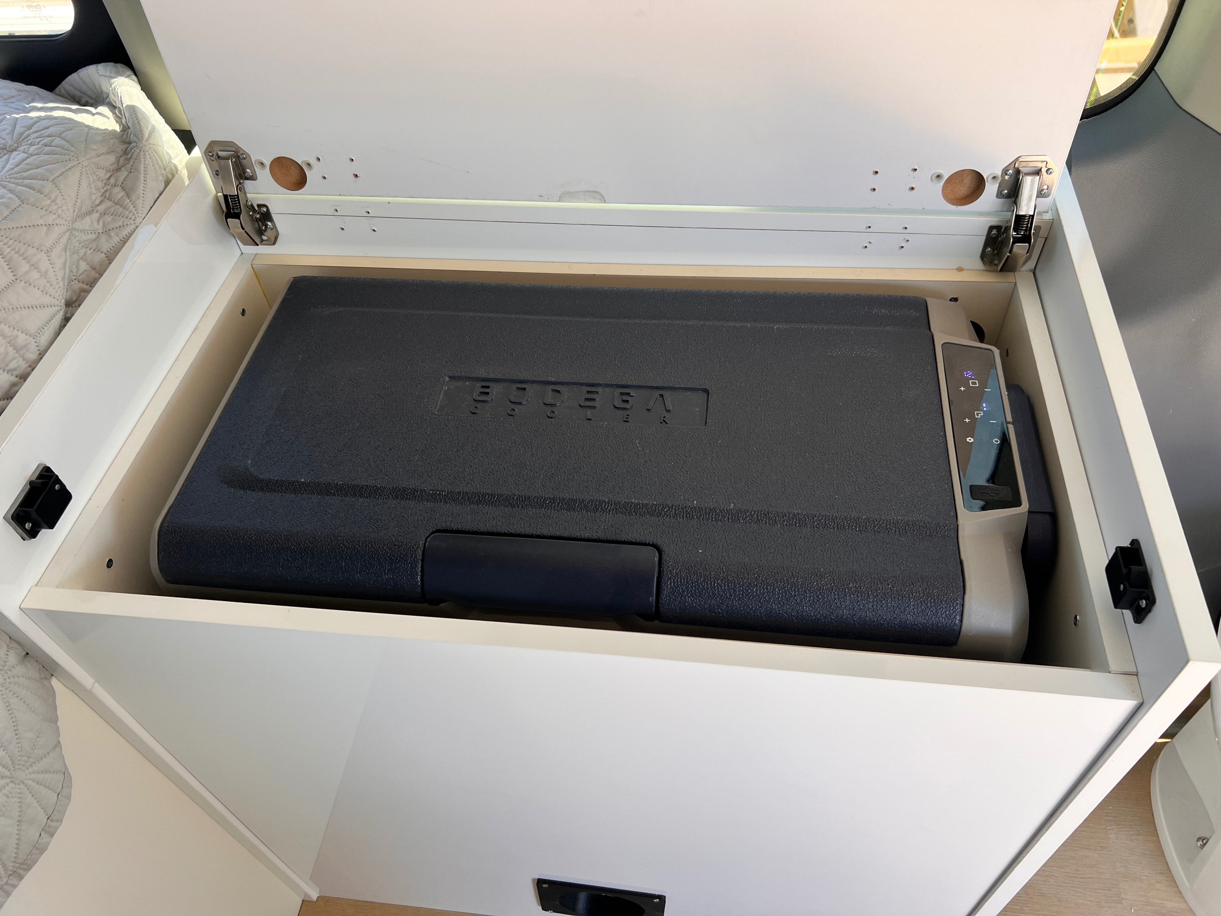 This RV rental features a Bodega portable fridge/freezer in a built-in storage compartment, perfect for travel.. Ford Transit 2016