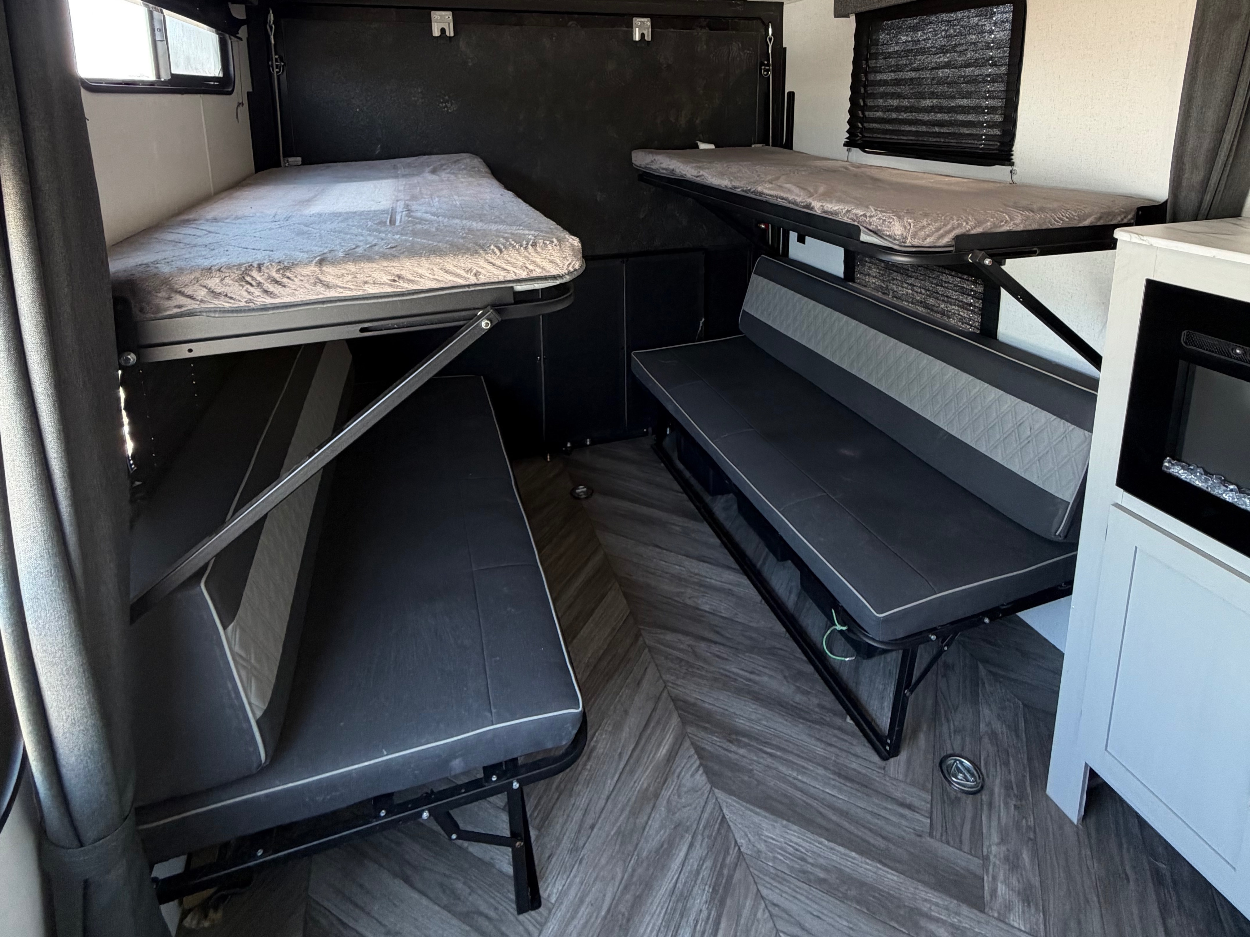 RV rental: flexible interior with two foldable bunk beds & bench seating. Perfect for adventure travel accommodations.. Forest River Salem 2022