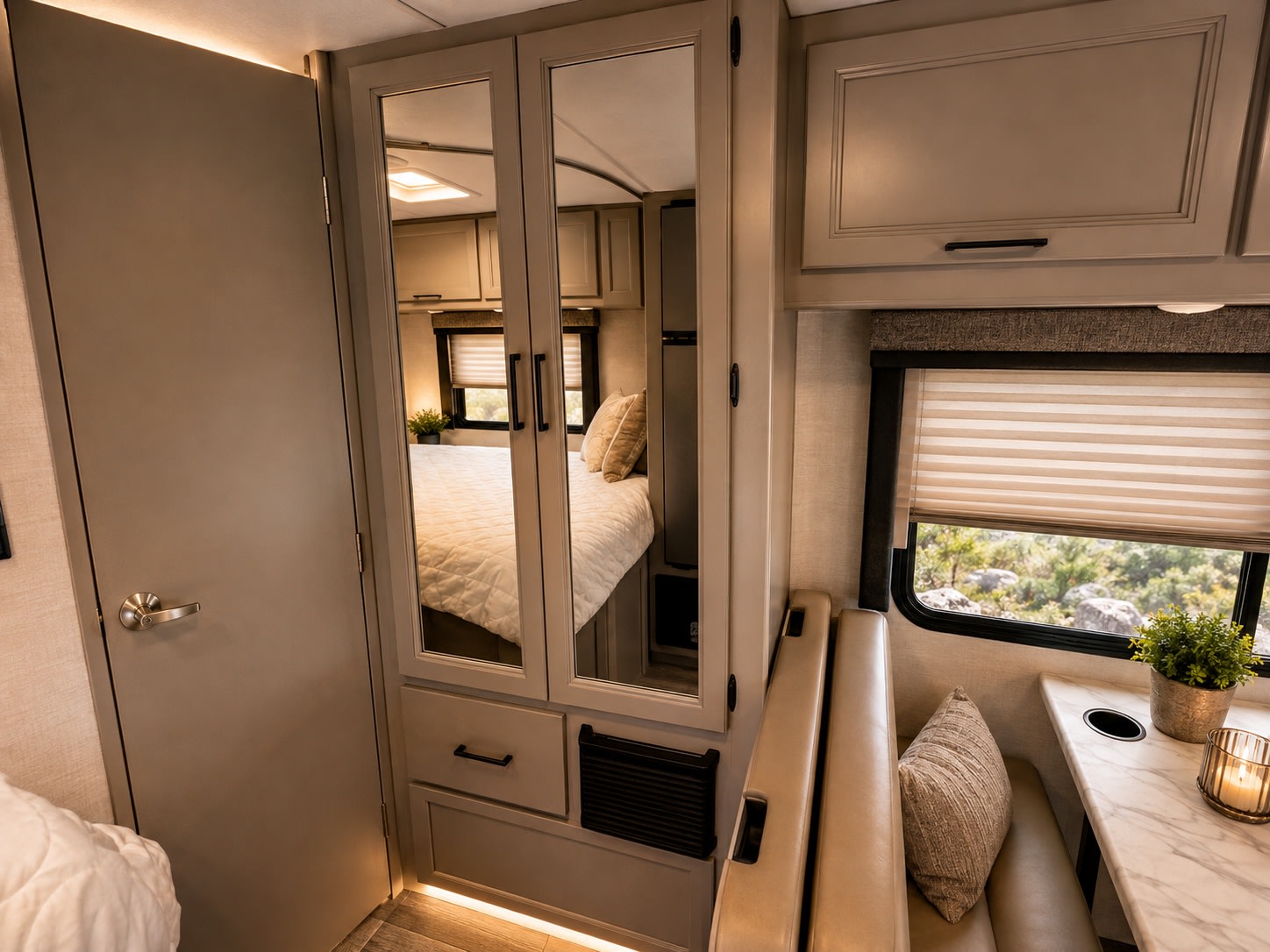 Experience comfort in this RV rental! Enjoy a modern interior with a cozy bedroom, dinette, and scenic window views.. Thor Coleman 2025