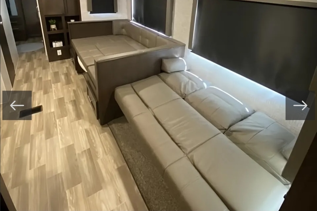 Explore this RV rental's clever interior: a U-shaped dinette and sofa transform into beds, maximizing space.. Forest River Other 2020