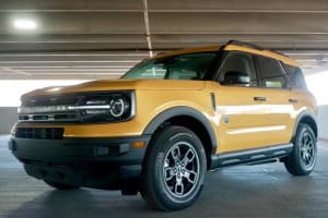 This eye-catching yellow Ford Bronco Sport offers adventure travel, a compact choice alongside your RV rental options