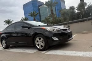 Black Hyundai Elantra car, a sleek option for travel, not an RV rental