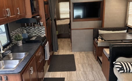 Experience Comfort and Adventure in Our Class A Holiday Rambler RV!