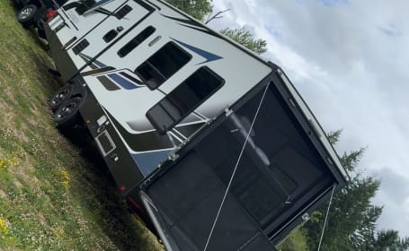 Adventure anywhere with this toy hauler/bunk house.