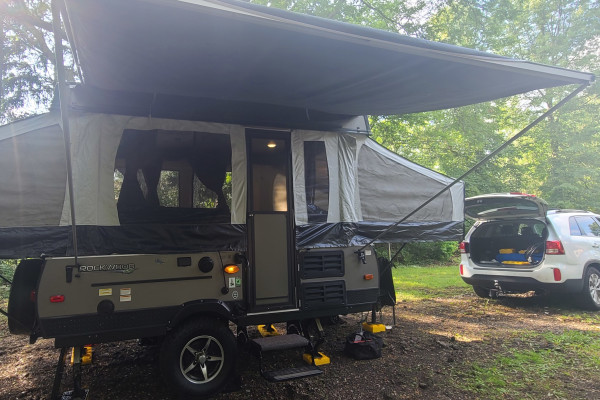The Adkins Family Rugged Family Camper where the AC is nice and cold.