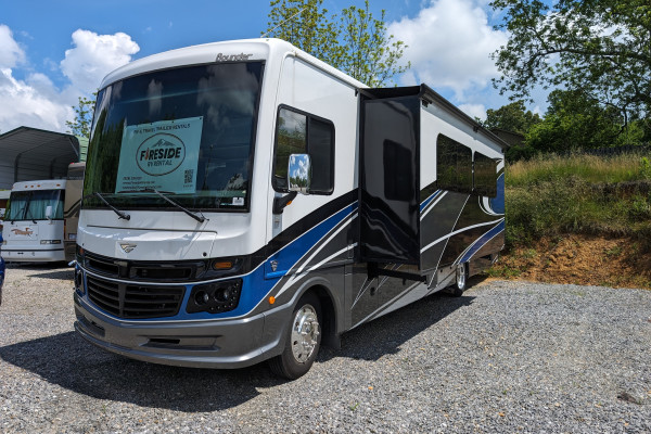 Travel in style in our luxurious Family-Sized Coach with outdoor TV! ASC108