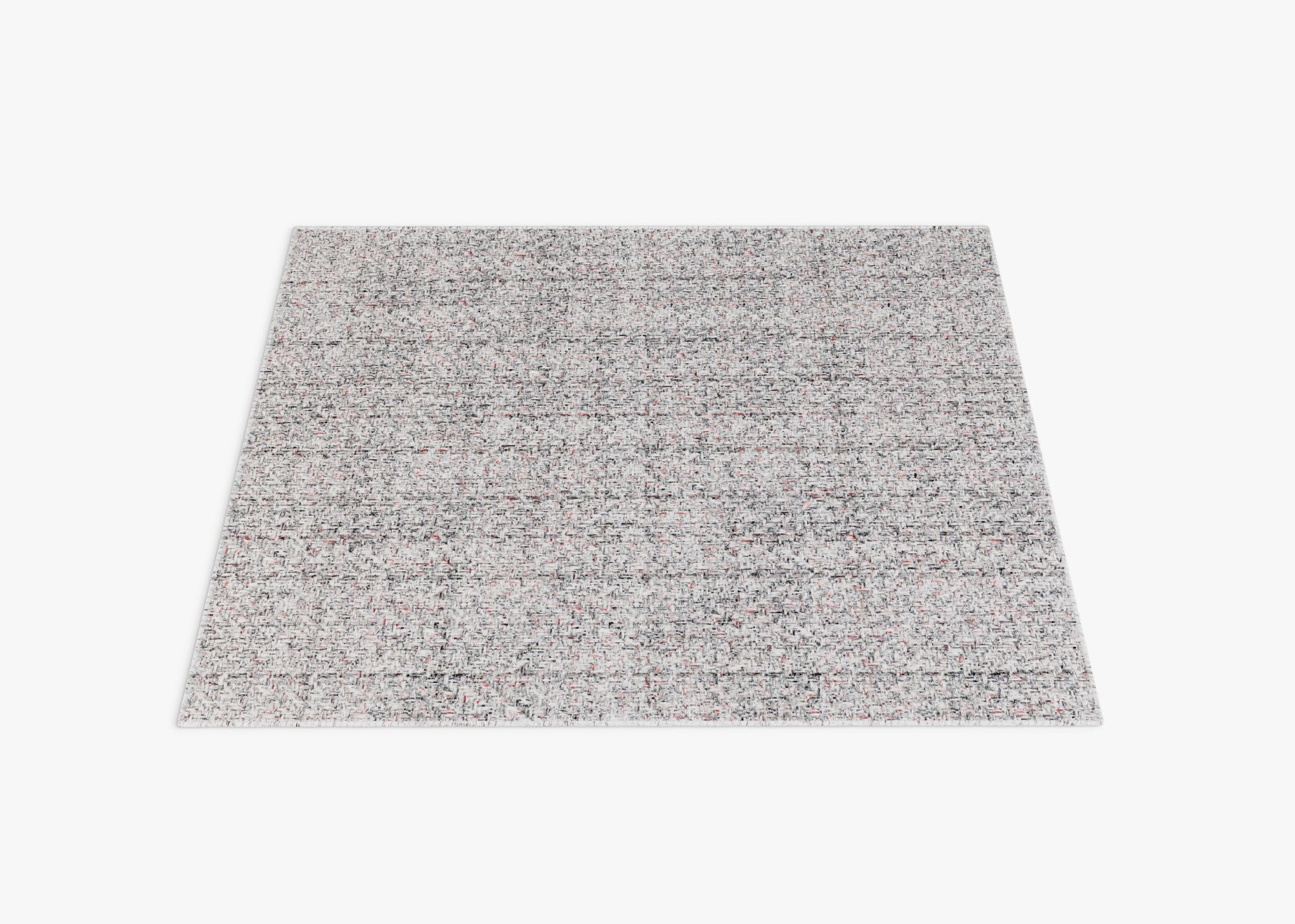 Eco-Friendly Outdoor Rug in Seashell Gray, laid flat, has a pattern that hides dirt.