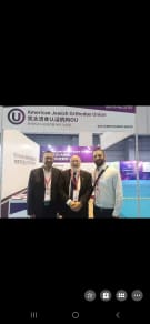 The Food Ingredients Asia (FIA) show. Rabbi Mordechai Grunberg (center), Binyamin Luntz (right) who works for OU Kosher and is fluent in Mandarin and Johnston Zhook (left) whose geirus was approved by Rabbi Genack. He physically inspected plants during COVID.