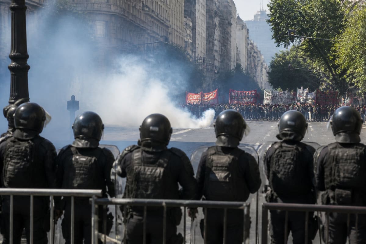 Argentine Police Fire Tear Gas To Disperse Mass Protests In Buenos Aires