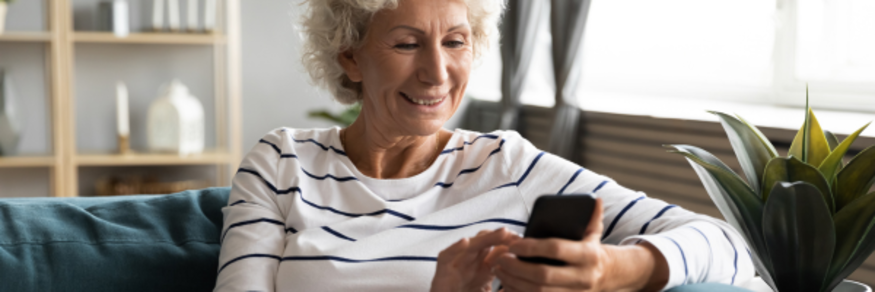 Lady smiling at phone