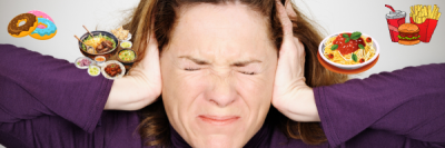 Woman covering her ears
